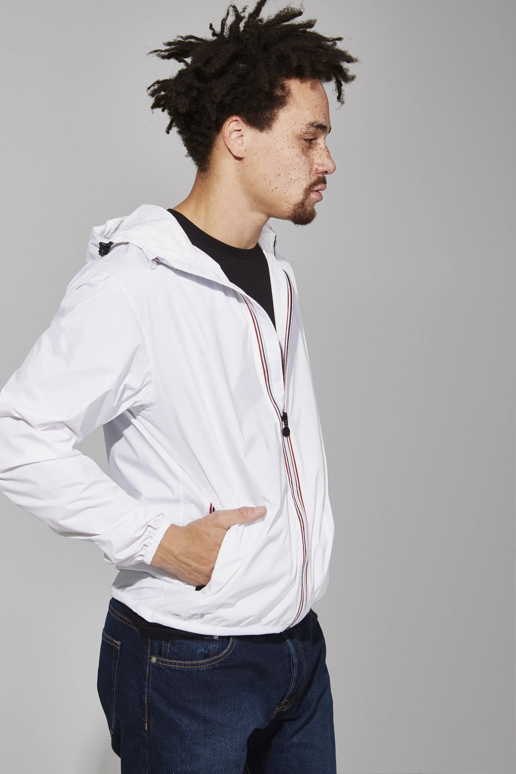 Men's white full zip packable rain jacket and windbreaker